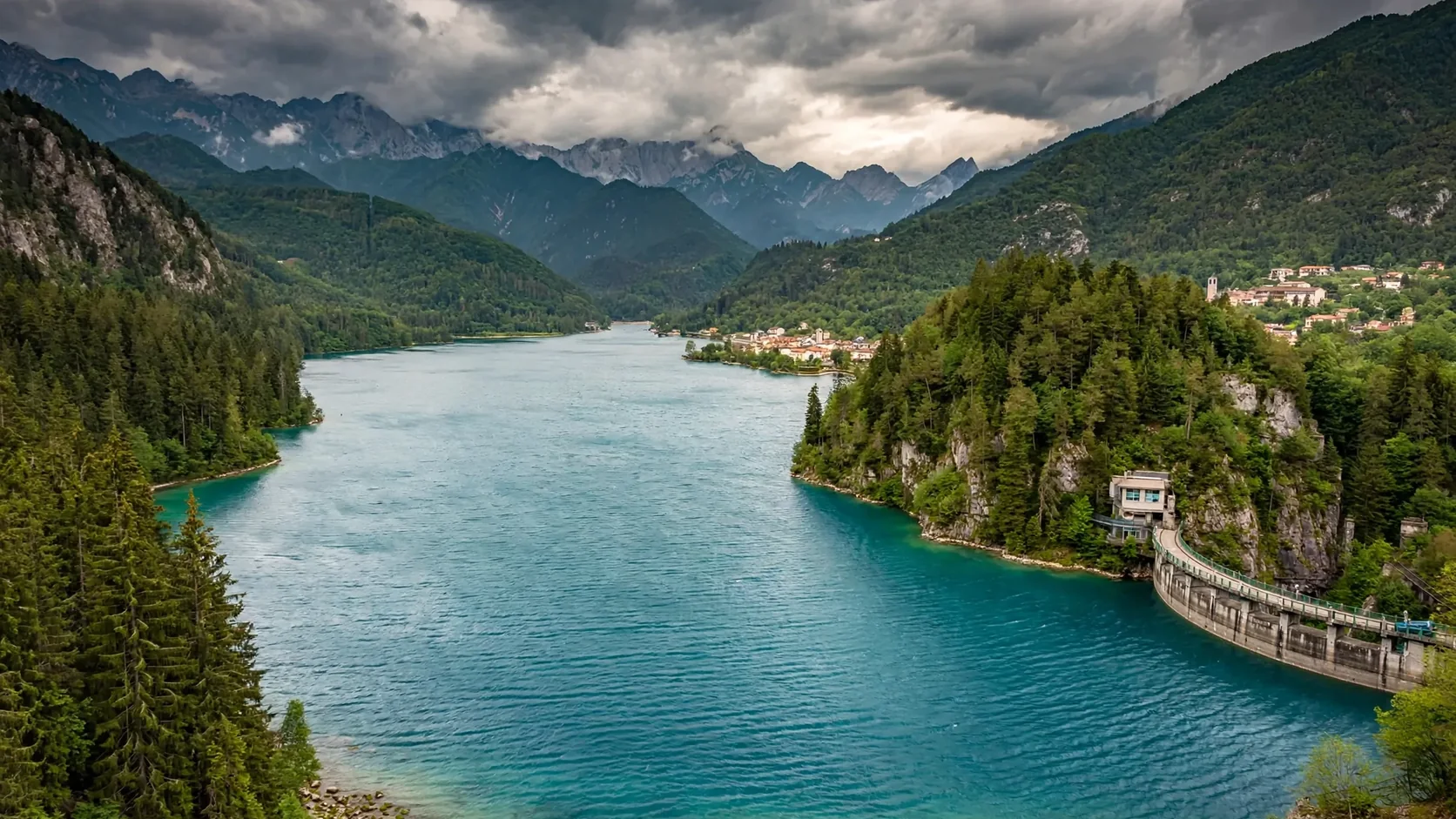 A calm mountain lake surrounded by evergreens